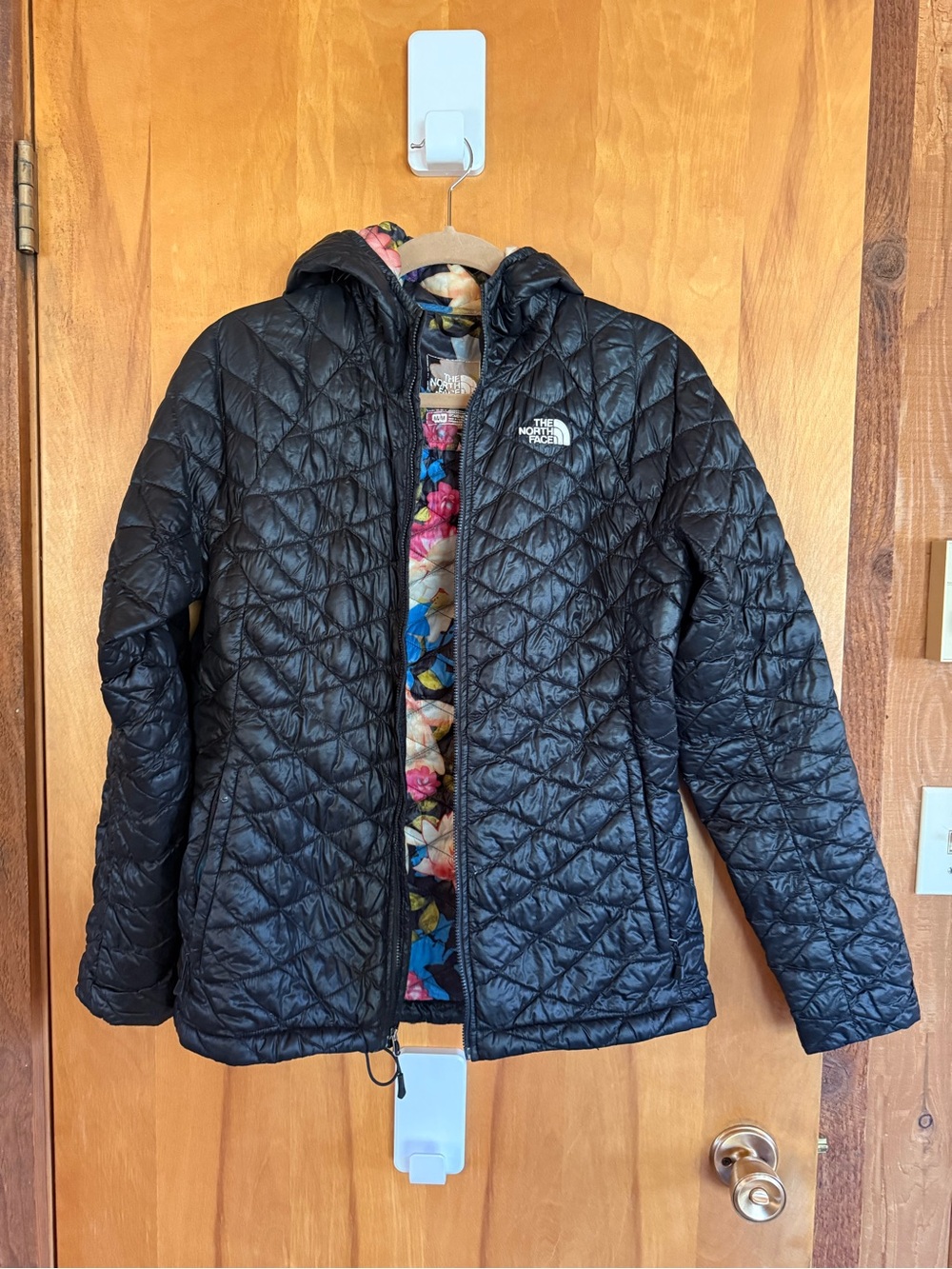 The North Face Black Quilted Hooded Puffer Jacket with Floral Lining